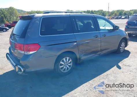 2010 Honda Odyssey Ex-L z USA, uszkodzony, nr VIN 5FNRL3H75AB007238